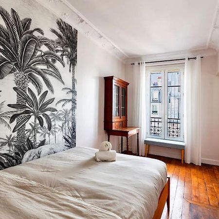 Charmant Appartement Au Coeur De Париж Екстериор снимка
