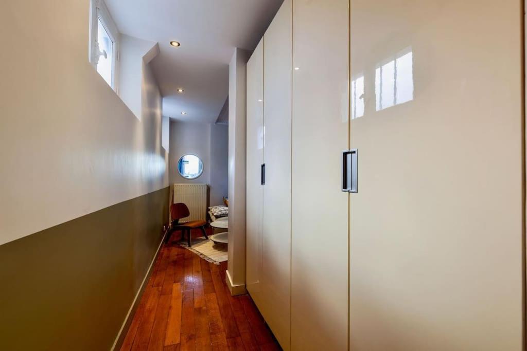 Charmant Appartement Au Coeur De Париж Екстериор снимка