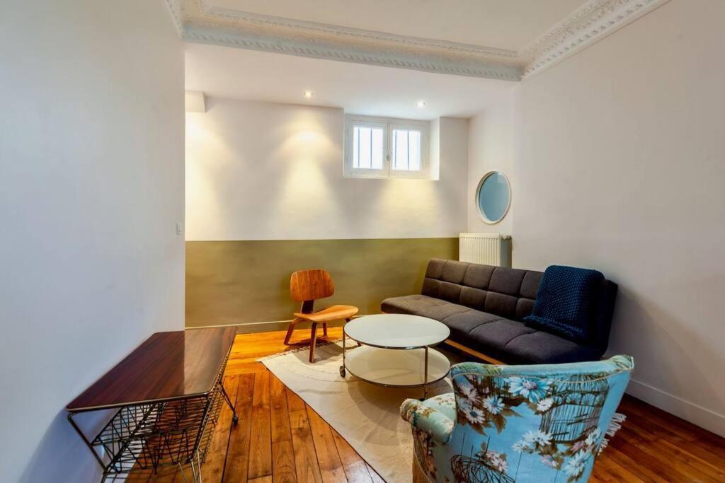Charmant Appartement Au Coeur De Париж Екстериор снимка
