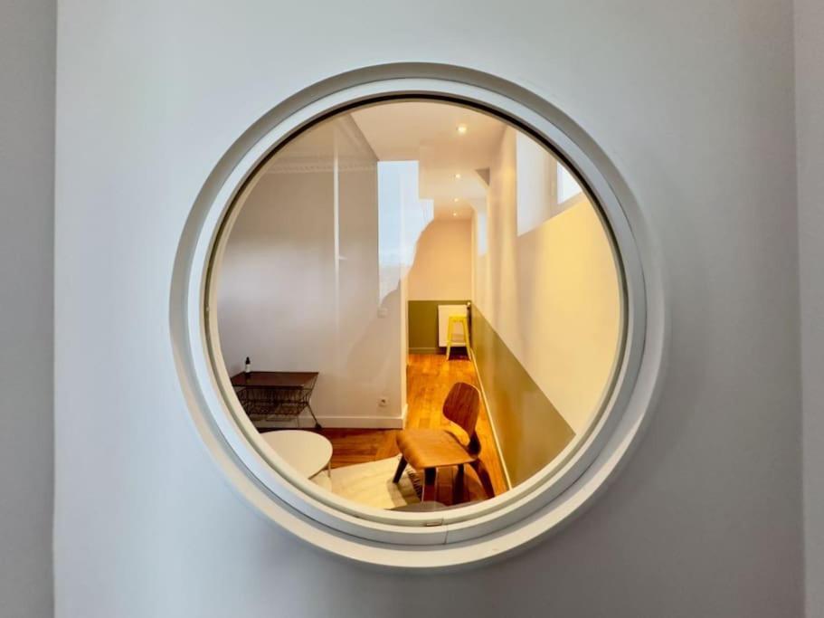 Charmant Appartement Au Coeur De Париж Екстериор снимка