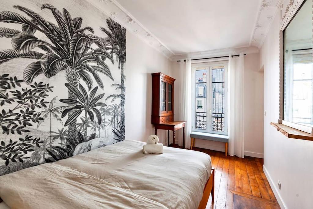 Charmant Appartement Au Coeur De Париж Екстериор снимка